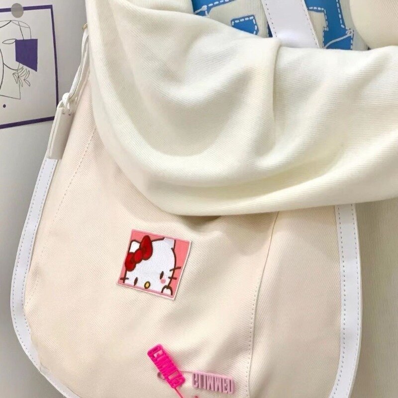 MBTI tas kanvas Hello Kitty wanita, lucu Korea populer tas Tote kapasitas besar gaya kuliah Fashion tas tangan wanita