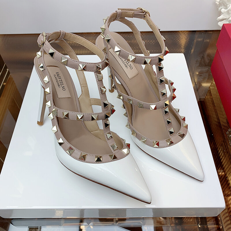 Sandali da donna estate 2023 gladiatore cinturino alla caviglia scarpe da festa rivetto di marca di lusso tacchi alti scarpe da donna firmate in vera pelle