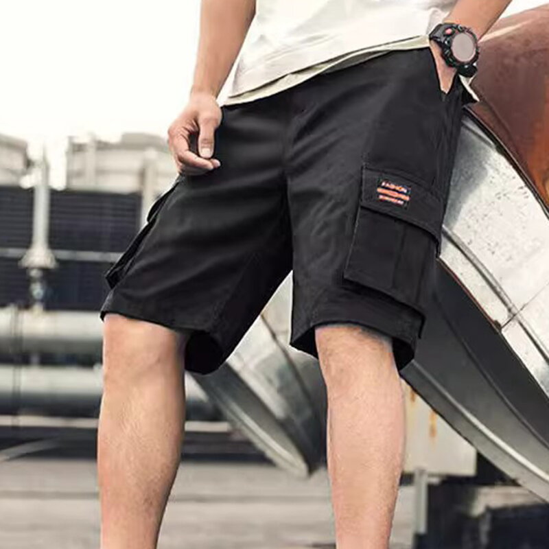 Pantalones cortos Cargo para hombre, Shorts holgados de Color sólido, con múltiples bolsillos, rectos, suaves, transpirables, de cintura media, de secado rápido, hasta la rodilla