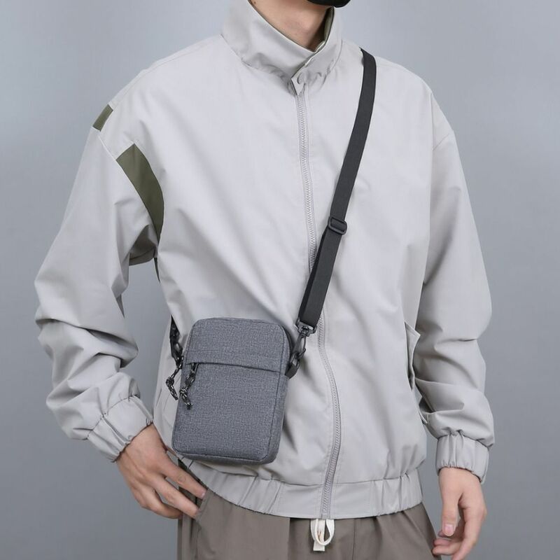 Borsa a tracolla da uomo Casual nuova borsa a tracolla sportiva coreana in tinta unita borsa per telefono da studente borsa piccola in Nylon