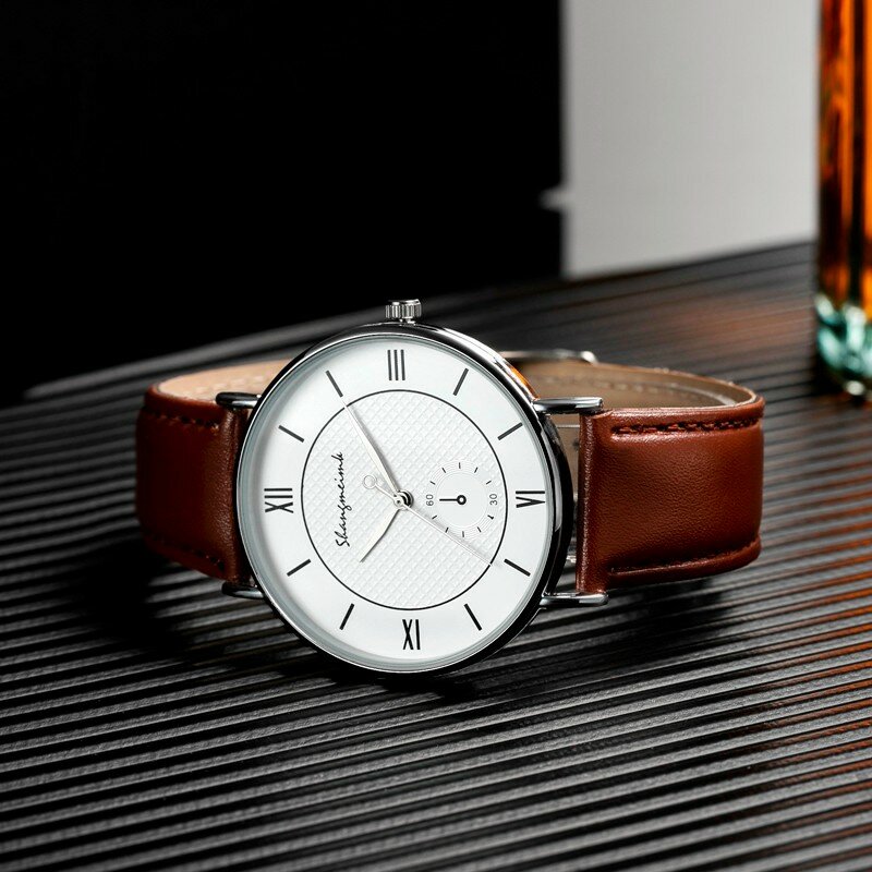 นาฬิกาควอทซ์สำหรับผู้ชายดีไซน์ธุรกิจนาฬิกาหนังเรืองแสงหรูหราสายหนังแฟชั่นหรูหรา