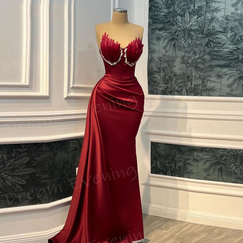 2024 beliebte rote Frauen Meerjungfrau bescheidene Abendkleider träger lose Feder Perlen Ballkleider Plissee Robe de Soirée Luxe Elégante