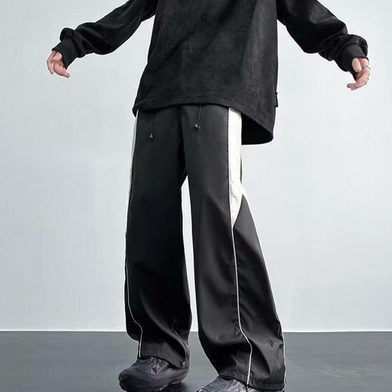 Celana panjang serut pinggang elastis pria, celana olahraga tali serut kaki lebar dengan selangkangan dalam pinggang elastis warna kontras lembut