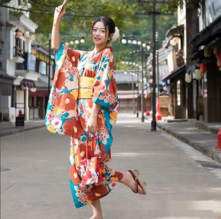กิโมโนผู้หญิงญี่ปุ่นปรับปรุงชุดกิโมโนยูกาตะใหม่เสื้อผ้าท่องเที่ยวของเด็กผู้หญิงน่ารัก