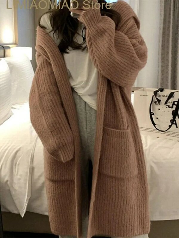 Nowe koreańskie damskie swetry jesienno-zimowe solidne długi dziany sweter z kapturem płaszcz na co dzień dla kobiet