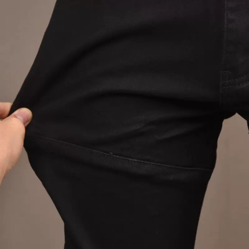 Odzież uliczna modne dżinsy męskie czarny kolor rozciągliwe dopasowanie pasował do splecionych designerskich jeansy dla motocyklistów Homme kieszeń na suwak spodnie w stylu Hip Hop Hombre