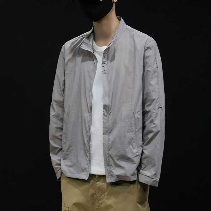 Cappotto di protezione solare giacca con tasche drappeggiate estive con cerniera in tinta unita per la pesca in campeggio