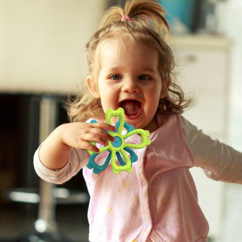 Anello per dentizione neonato giocattolo da masticare per cartoni animati massaggiagengive in Silicone anello per dentizione a forma di fiore flessibile carino per camerette per bambini sicuro