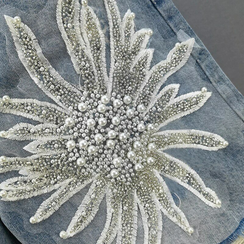 Poszarpane dziury dżinsowe szorty z koralikami damskie letnie z wysokim stanem krótkie spodnie z kwiatem na co dzień z szerokimi nogawkami proste spodenki