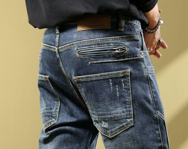 Primavera autunno stili americani Jeans da uomo Multi cerniera Hollow Slim Fit Splicing Denim Pants
