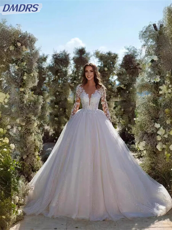 エレガントな長袖のウェディングドレス,クラシックなチュールのブライダルガウン,ロマンチックなレースのアップリケ,花嫁のドレス