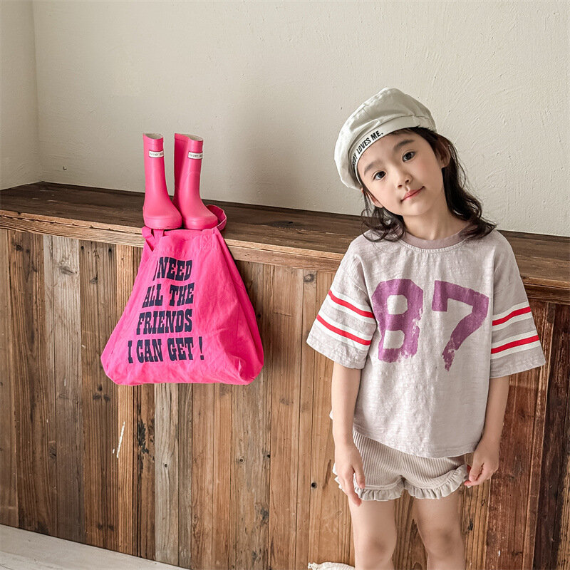 Camisetas de manga corta para niños y niñas, ropa de algodón con estampado de letras, informal, holgada, versátil, novedad de verano 2024