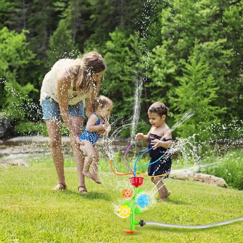 Zraszacz wody dla wirującego zraszacza kwiatowego z dyszami, woda porusza się w basenie na trawnik ogrodowy gra na świeżym powietrzu