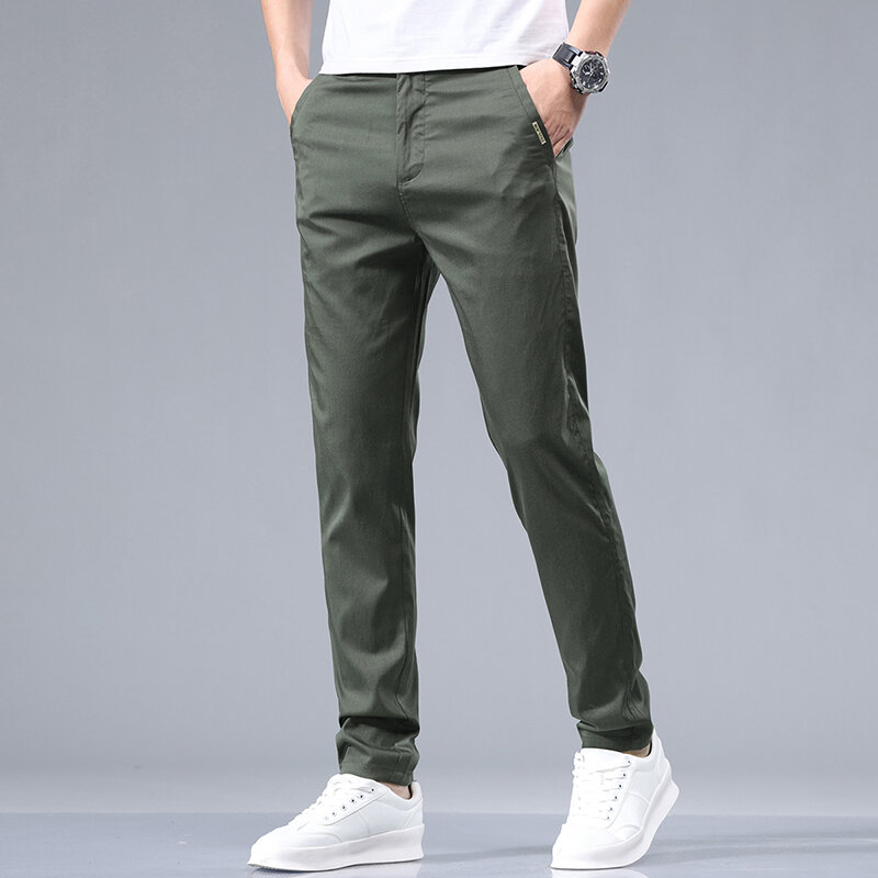 Celana panjang kasual elastis pinggang Menengah Dasar pakaian pria warna Solid kantong harian musim panas disambung celana panjang kancing lurus