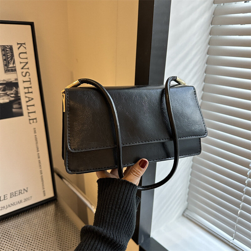 Nuova borsa a tracolla da donna borsa a tracolla a tracolla con Design di nicchia minimalista borsa a tracolla con bastone per ascelle di lusso leggero con sensazione di fascia alta