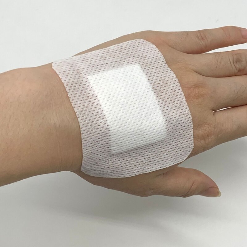 10pcs 6x7cm Non-woven Medical Adhesive Hemostasis Plaster Wounds Dressing Band Aid Bandage First Aid Tool