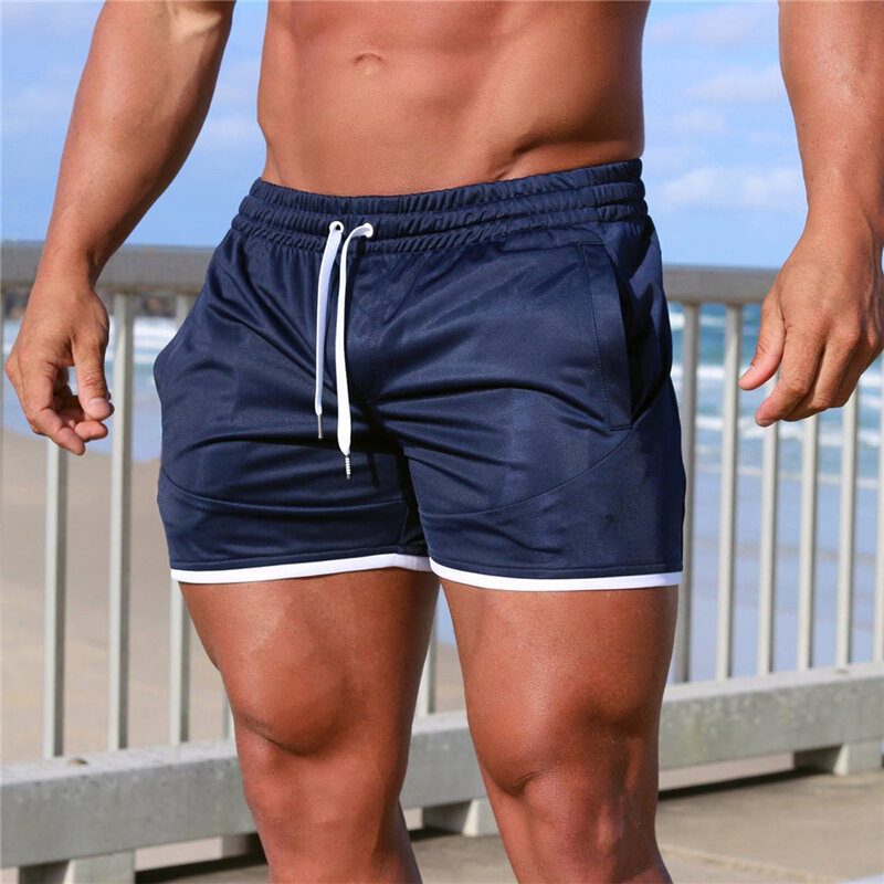 Moda uomo pantaloncini da spiaggia sportivi pantaloni Bodybuilding pantaloni sportivi Fitness Short Jogger palestre Casual pantaloncini da uomo