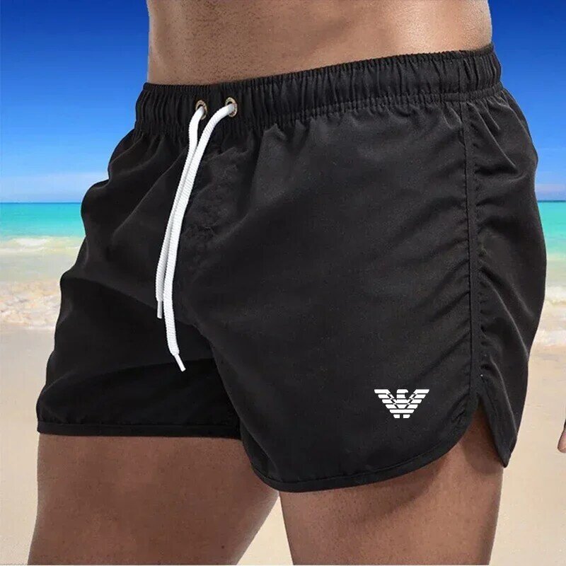 Celana pendek pantai pria, celana pendek ketat dan Bermuda informal, cepat kering, modis, gym dan kebugaran