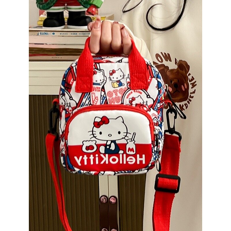 MBTI tas bahu Hello Kitty wanita, dompet koin wanita kasual imut nilon tas selempang motif kartun gaya Jepang kecil