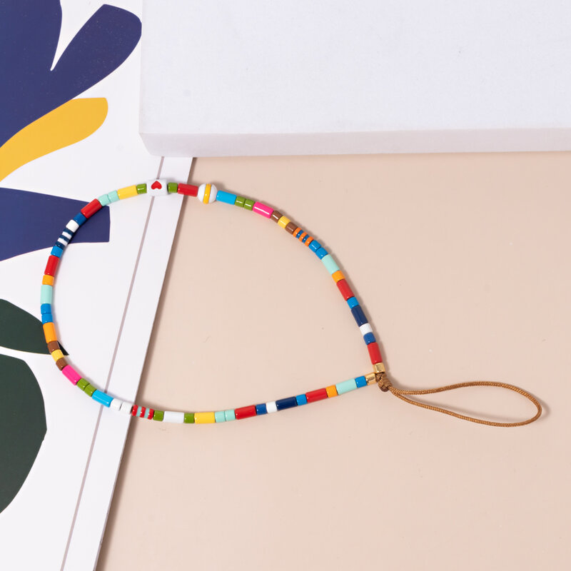 Nowy projekt kolorowe emaliowane łańcuszek do telefonu rura metalowa koraliki tęczowe Bohemaion akcesoria do telefonu anty-skradziona biżuteria dla kobiet dostawca