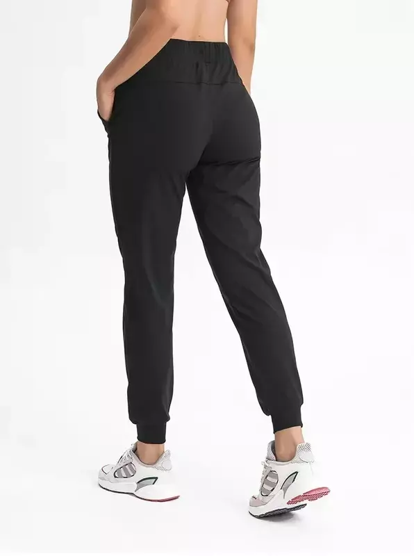 Damskie spodnie do jogi Lulu rozciągliwe tkaniny luźny krój treningowe spodnie sportowe sportowe spodnie z boczne kieszenie spodnie do kostek moro