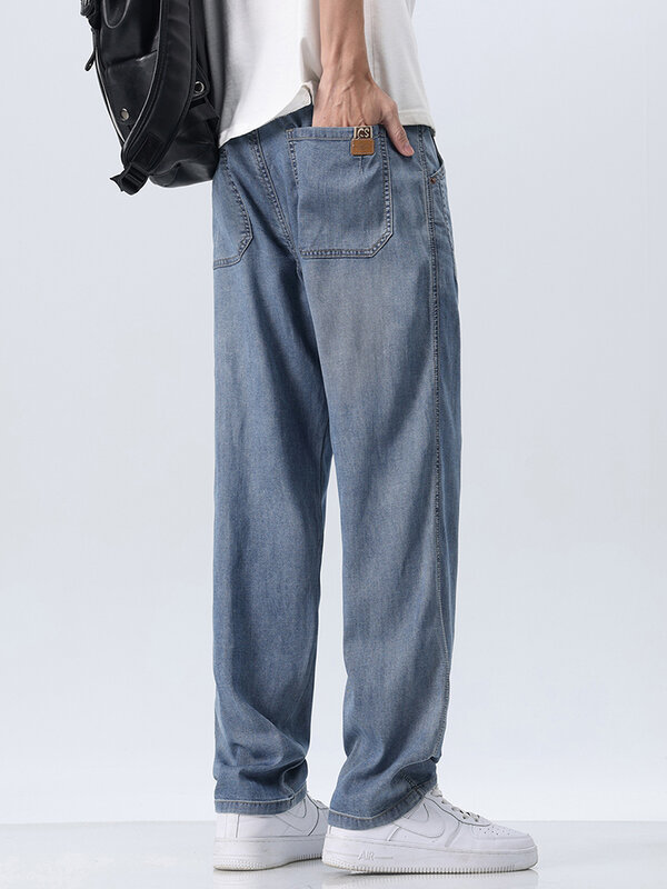 Lyocell celana Jeans tipis pria, celana Denim longgar kasual lurus lembut musim panas 28-38