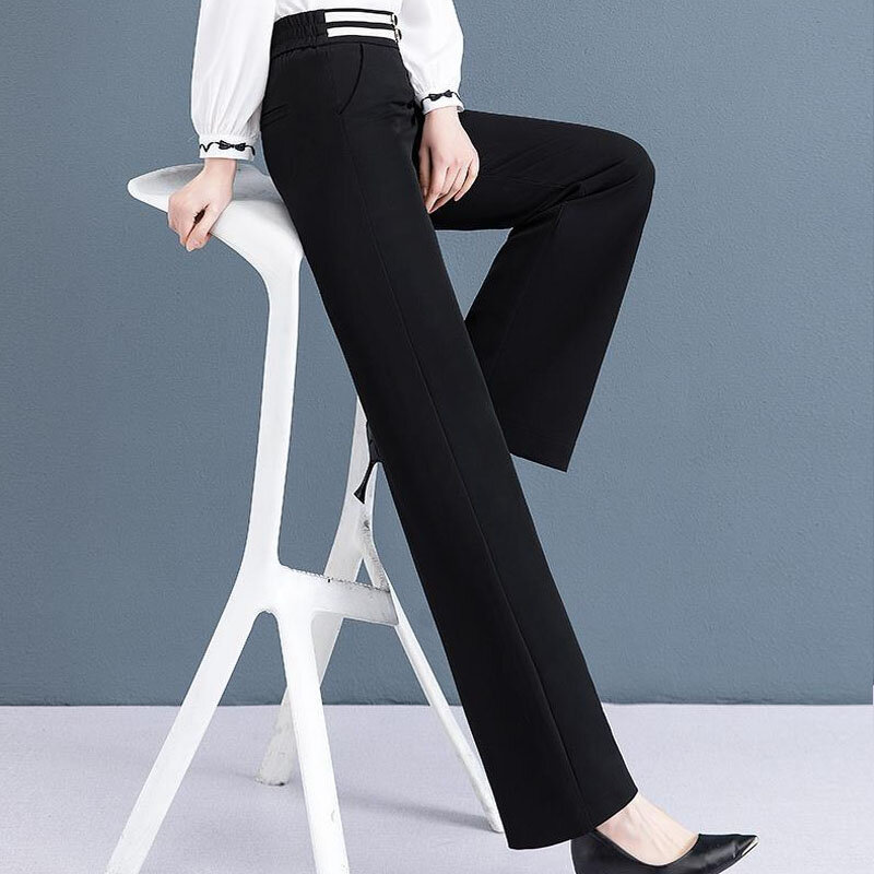 Pantalones rectos de pierna ancha para mujer, calzas sueltas de color blanco cremoso y negro, cintura elástica, sensación de flacidez, decoración de líneas brillantes, bolsillos con botones