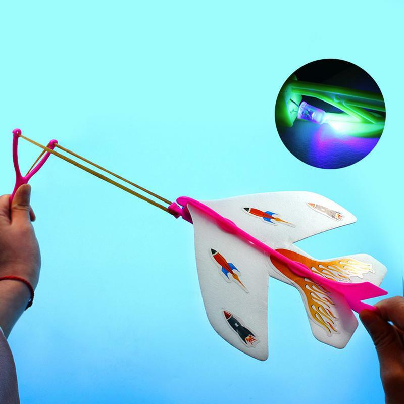 LED Light Avião Planador Slingshot Aviões Para Crianças Forma Avião Planador Lançador Mão Favor Do Partido Decorações Presente De Aniversário