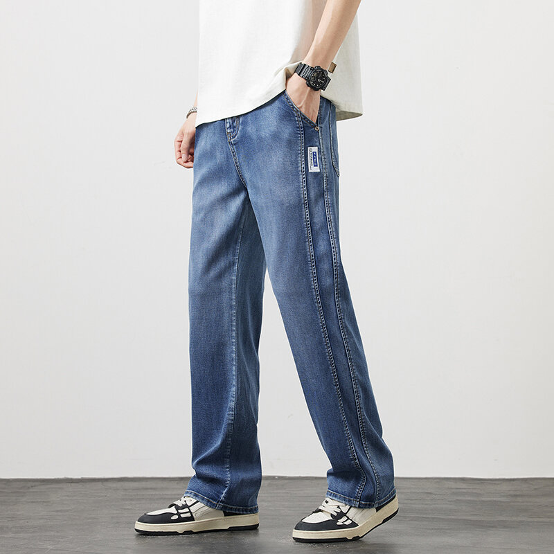 Letnie nowe męskie Ultra-cienkie luźne proste dżinsy wygodne spodnie Lyocell koreańska moda Retro niebieski i czarny spodnie dżinsowe