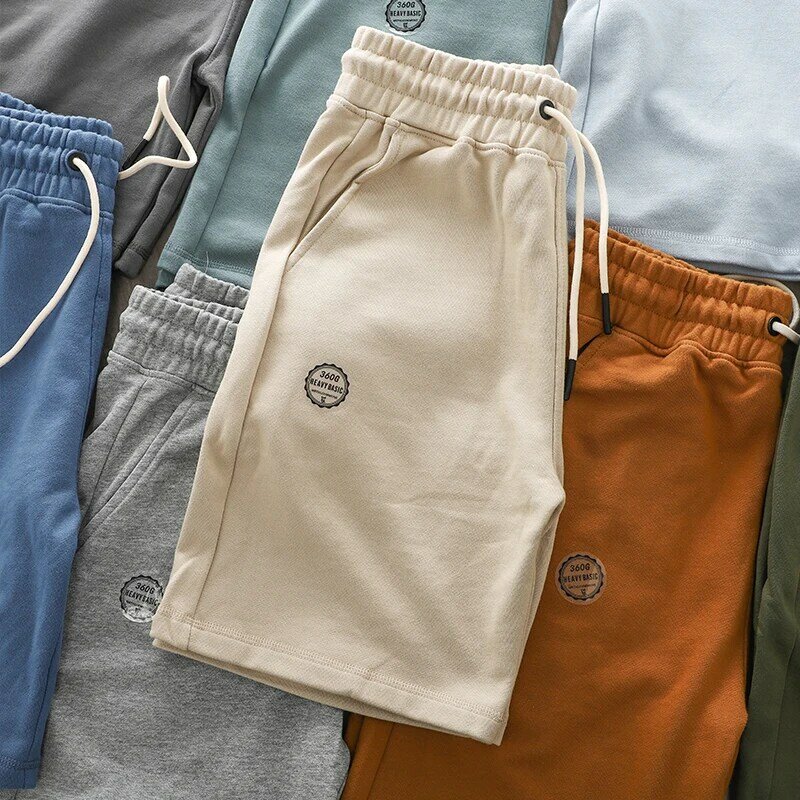 DUKEEN celana pendek katun 360G, celana olahraga longgar luar ruangan musim panas, celana gelombang lima titik warna polos Jepang