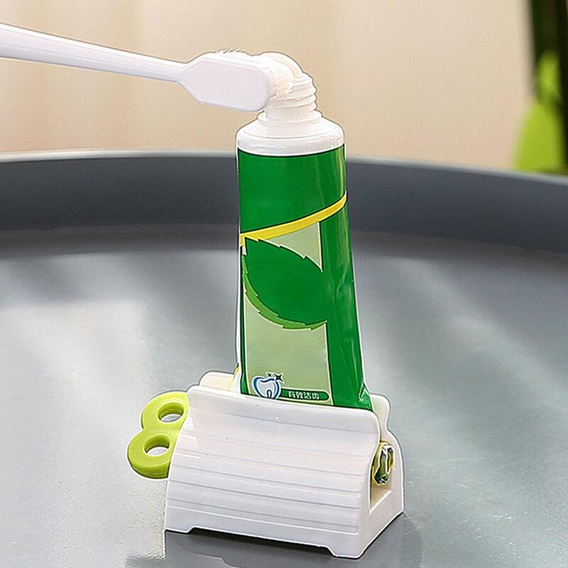 1ชิ้นหลอดบีบยาสีฟันพลาสติกใช้ในบ้านทำความสะอาดที่ยึดเครื่องจ่ายง่ายอุปกรณ์ E3B6กลิ้งในห้องน้ำ