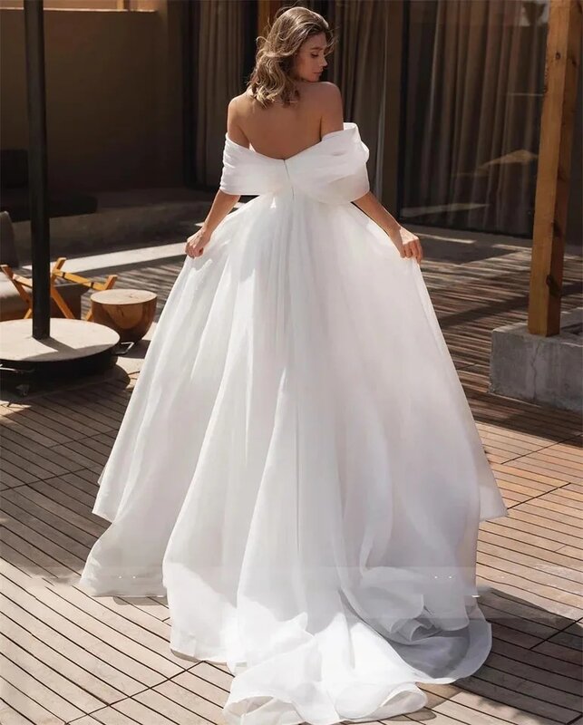 ชุดแต่งงานโบฮีเมียน2023ชุดเจ้าหญิงผ้าโปร่งเปิดไหล่ทรงเอแบบเซ็กซี่สำหรับผู้หญิงปรับแต่งขนาดได้สวยงาม