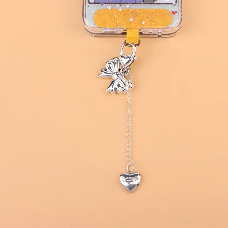 Porte-clés nœud papillon en métal argenté, porte-clés vintage, pendentif de sac, sac pour écouteurs, sac à dos, accessoires de confrontation, document Y2K, nœud en forme de cœur