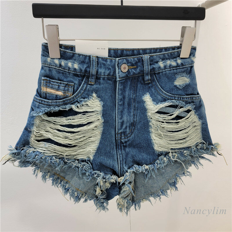 2024 Summer New Hot Girl pantaloncini di jeans dal Design consumato pantaloni caldi A gamba larga dimagranti larghi da donna All-Match