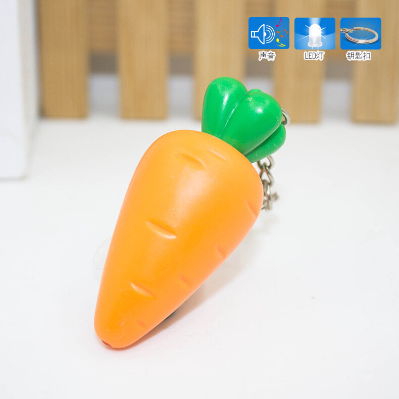 Cartone animato carino verdure ciondolo creativo portachiavi carota a emissione di luce con musica regalo di compleanno per bambini giocattoli a emissione di luce