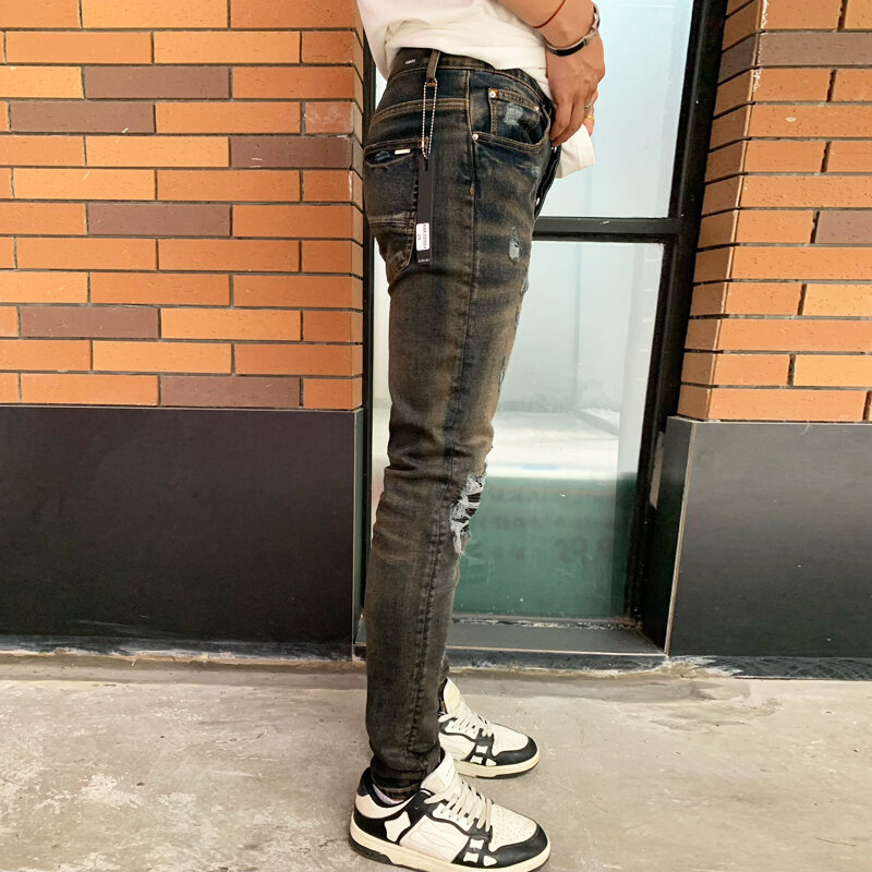 Główna ulica modne męskie jeansy w stylu Vintage sprane elastyczne obcisłe niebieskie czarne dżinsy skórzany Panel męski projektant Hip Hop marki P