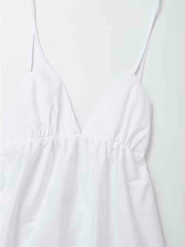 فستان ميدي مثير بدون ظهر بدون أكمام برقبة على شكل V موضة صيف 2023 للسيدات فستان شاطئ فضفاض غير رسمي فستان أبيض طويل للإجازات
