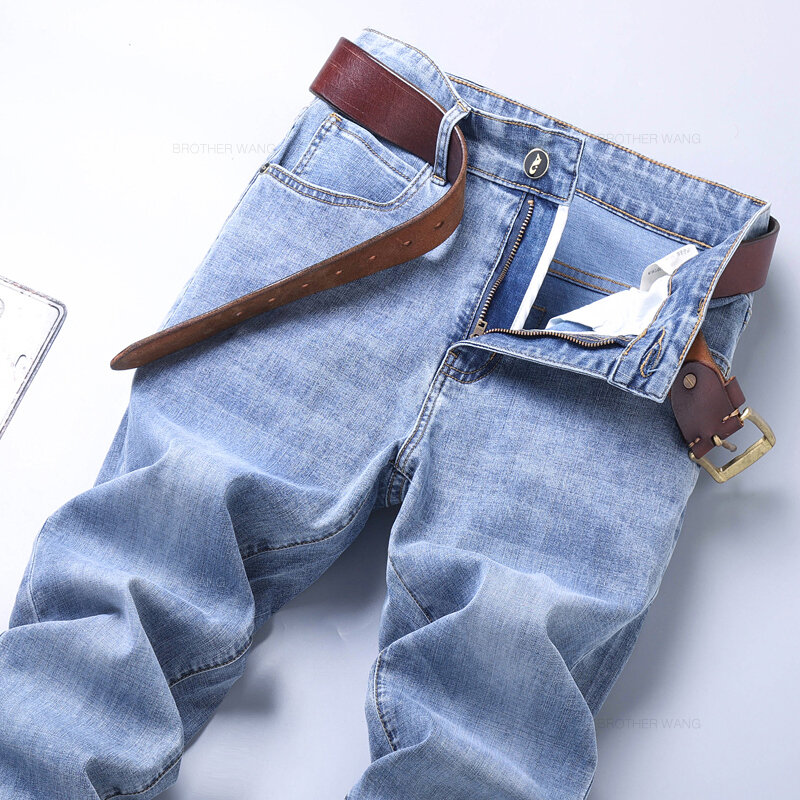 Jeans Slim blu chiaro da uomo sottili primaverili ed estivi eleganti pantaloni Casual in tessuto elasticizzato pantaloni classici grigio fumo