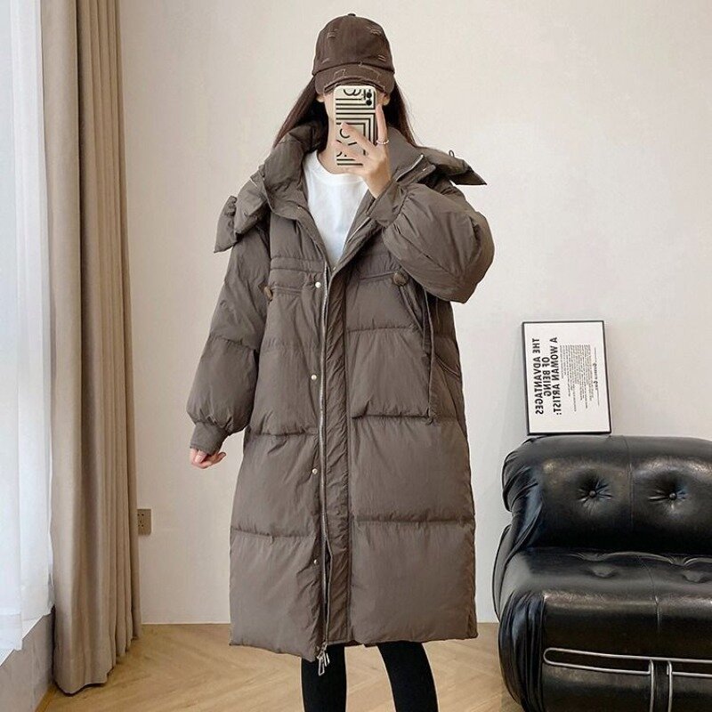 Jaket Parkas bertudung untuk wanita, mantel panjang selutut tebal dan longgar saku besar Musim Dingin 2023