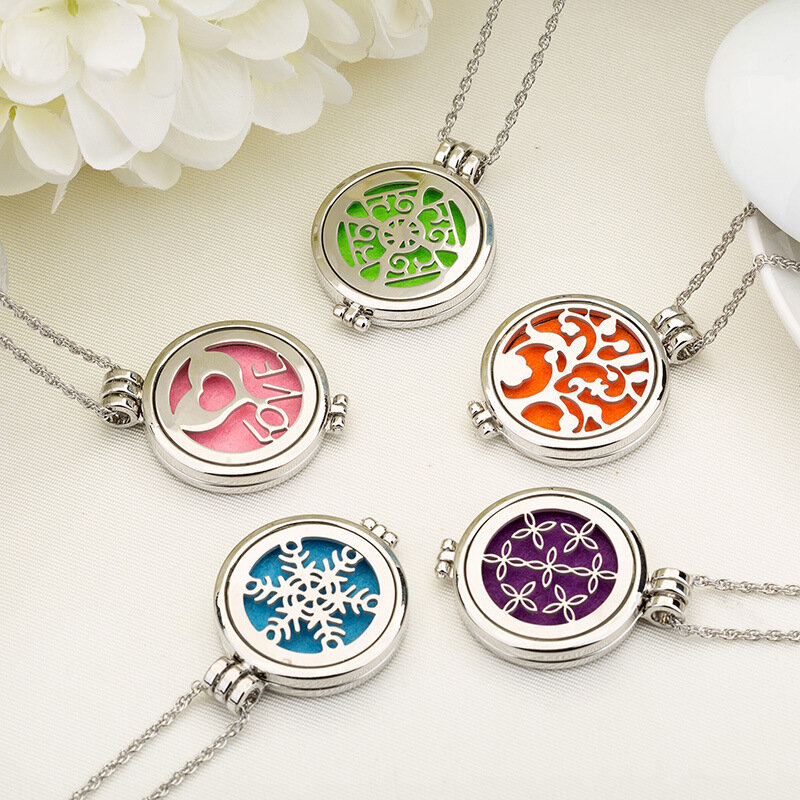 Hot selling hollow and luminous aromatherapy necklace, fashionable stainless steel diffuser photo box DIY pendant