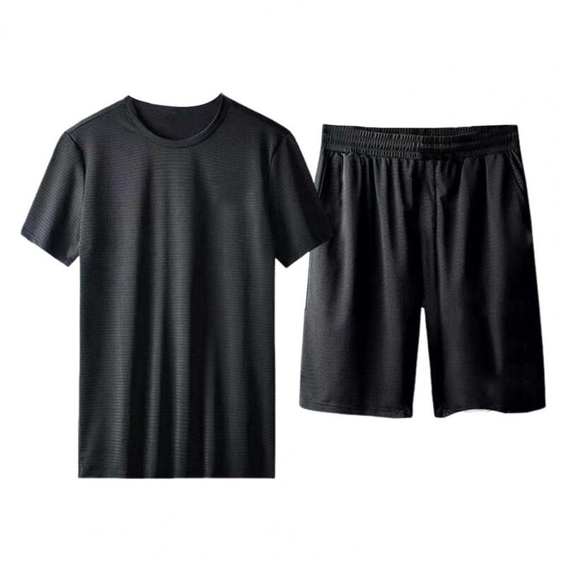 Conjunto de ropa de gimnasio para hombre, Camiseta de cuello redondo, pantalones cortos de pierna ancha, ropa deportiva de Color sólido con cintura elástica