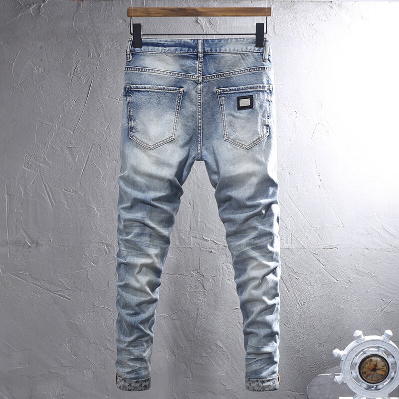 Jeans da uomo di moda di strada Jeans strappati Slim Fit elasticizzati blu retrò di alta qualità da uomo pantaloni di Jeans Vintage firmati con patch Hombre