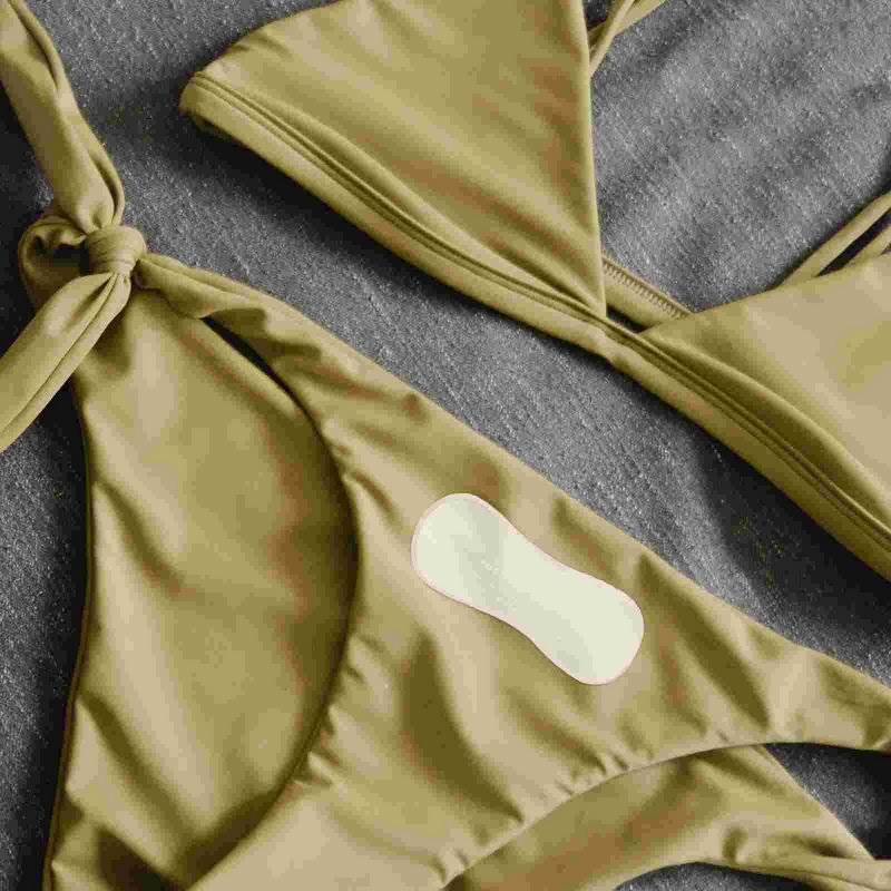 Fodera igienica per costume da bagno da 50 pezzi per testare la biancheria decalcomania protettiva adesiva per costumi da bagno slip adesivi per mutandine etichetta trasparente