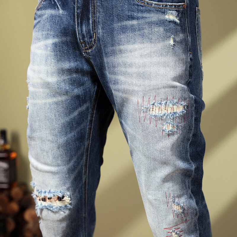 Modne dżinsy męskie uliczna niebieskie w stylu Retro zwykłe elastyczne obcisłe potargane dżinsy męskie naszywane patchworkowe designerskie spodnie w stylu Vintage Homme