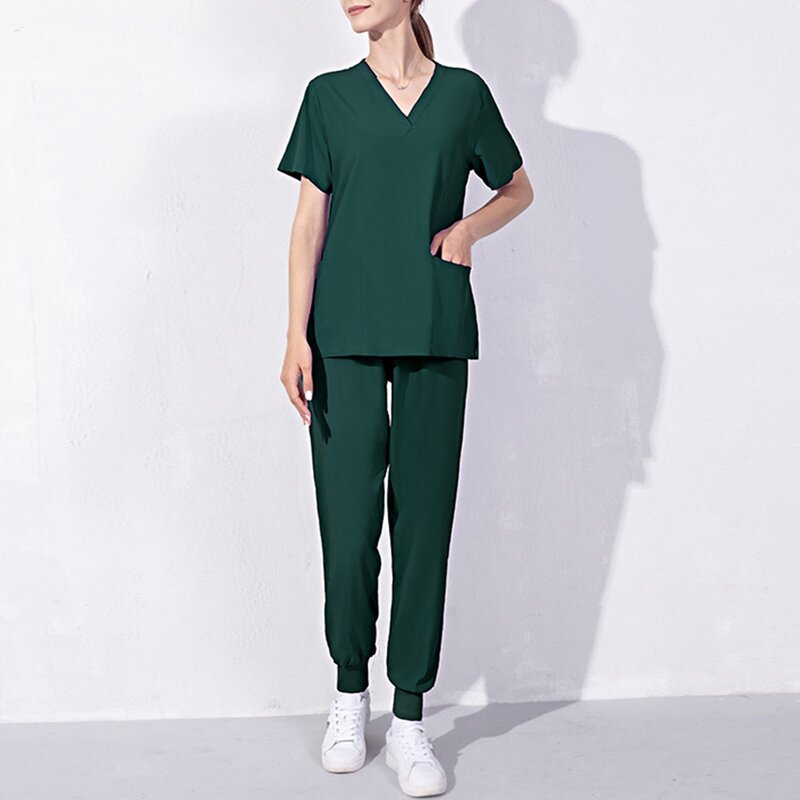 Uniformes de trabajo de Color sólido para mujer, conjunto de ropa informal ajustada de manga corta con bolsillo y cuello en V, traje de enfermera para salón de Spa
