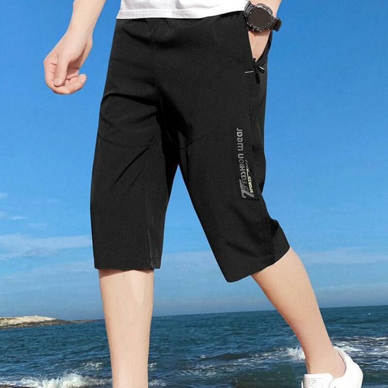 Однотонные укороченные брюки, мужские укороченные брюки с эластичным поясом и карманами на молнии, мягкие дышащие удобные брюки до середины икры