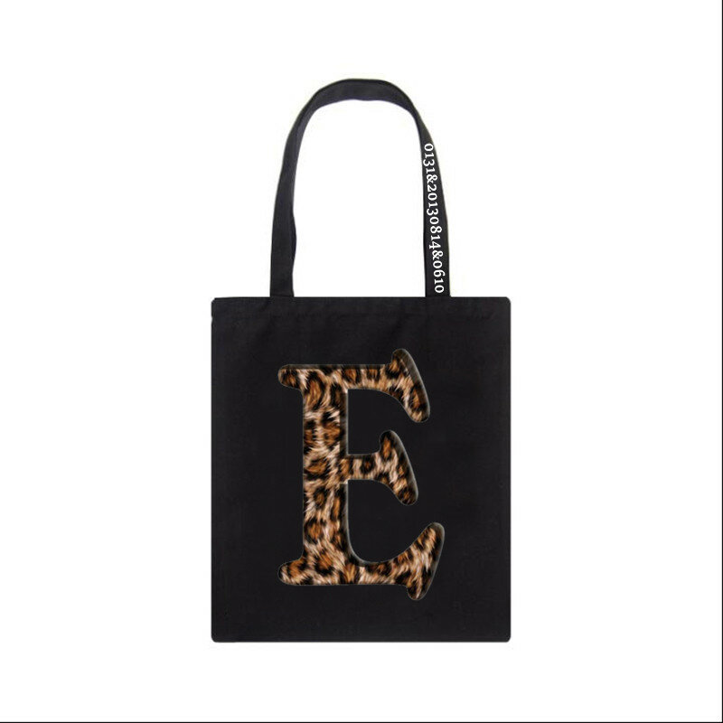 カスタマイズ可能なヒョウ柄のキャンバスバッグ,大容量のショッピングバッグ,アルファベットの文字,黒,ハンドバッグ
