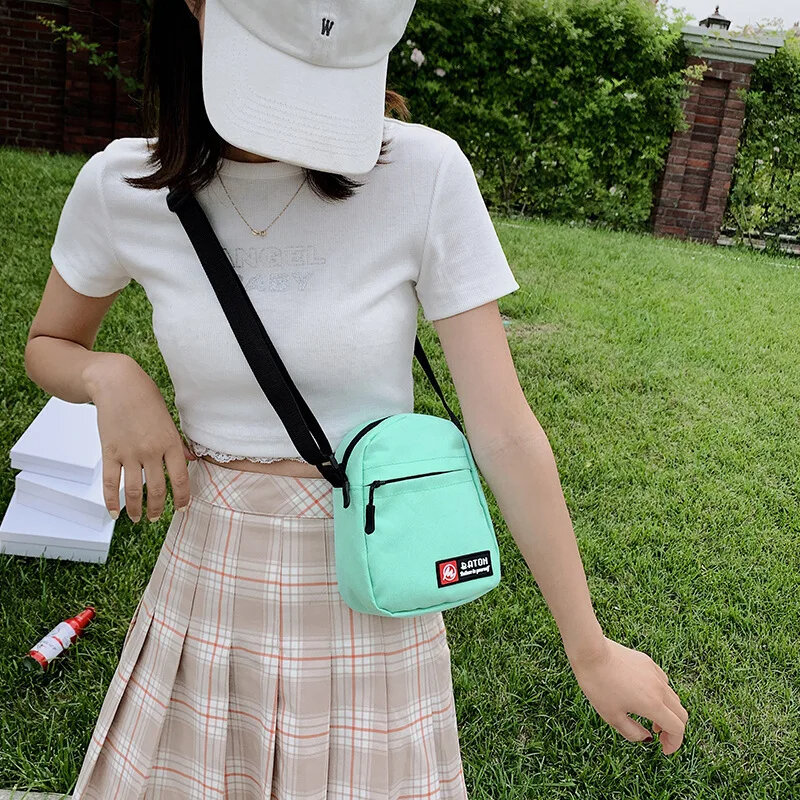 Nuova borsa per cellulare in tela borsa a tracolla moda per donna studente Versatile piccola borsa a tracolla Mini borsa a tracolla Unisex 2024