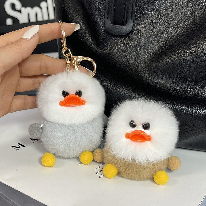 Giveaway small yellow duck otter rabbit fur keychain