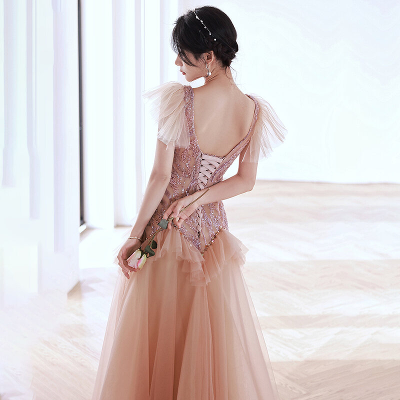 ฤดูร้อนสีชมพู Dress Model Baru อารมณ์สีขาวและบางลึก V ผ้าพันคอปลอกแขนแบบมีระบายชุดโรแมนติกสไตล์หวาน